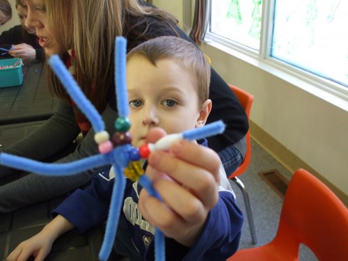 A fun day of crafty art kept the children busy at the Cornerstone Family and Youth gathering recently. Here Isaac Bouchard shows of some of his handiwork.