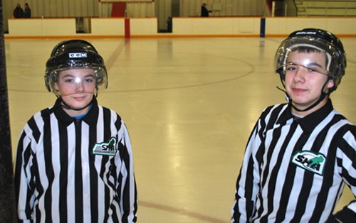 Young referees Luke McCrimmon (left) and Brett Turgeon get ready for a game at the Carlyle Minor Hockey Day on Saturday, Jan. 15.