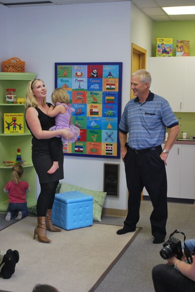 Jen Sedor (left), program co-ordinator for the Cornerstone Family and Youth, speaks with Carlyle mayor Don Shirley during the grand opening of the new Playroom space.