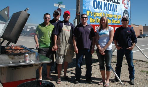 Enbridge Pipelines (Saskatchewan) Ltd. held its annual barbecue to raise money for United Way Aug. 26.  The company is a huge supporter of United Way and the annual barbecue is just one way it raises money for the organization. Leon Brooks, Kourtlin Reddick, Larry Brown, Wade Trippel, Ashley Stephenson and Blaine Warner were busy at work during the hot sunny day, grilling up burgers and smokies, taking donations and helping in away way possible.