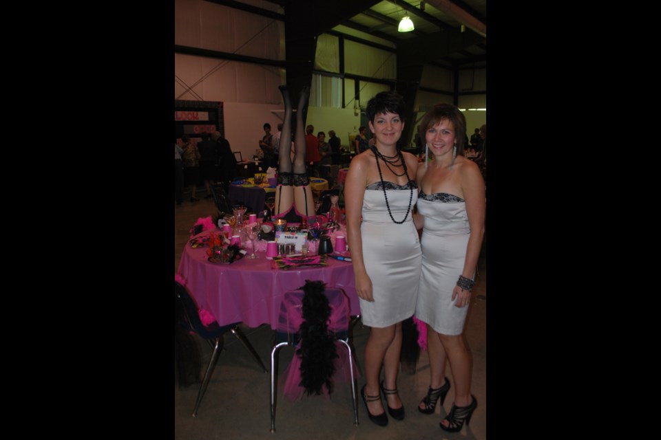 Hostesses Jennie Beaudet (left) and Tracey Johnson (right) from Carlyle pose with their Creative Table.