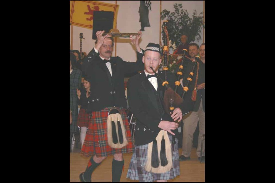 The Yorkton & District Scottish Society hosted its 34th Annual Robbie Burns Dinner and Dance at the Royal Canadian Legion Hall in Yorkton Saturday. The event marked the 253st anniversary of the famed Scottish poet who was born in 1759. Here piper Sean Craib-Petkau leads in haggis-bearer Robbie Stout.