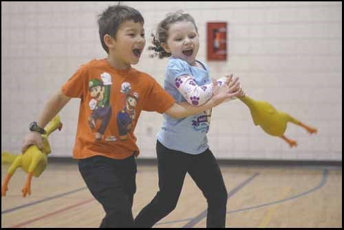 Cody Schmitt and Sarah Hodgson chase one another with rubber chickens around the Gloria Hayden Community Centre on Saturday afternoon. The City of Yorkton is experimenting with bringing back &#8220;Cure Family Cabin Fever&#8221; days &#8212; afternoons of free family activity at the centre &#8212; with two trial days this month. The next free afternoon is on Jan. 28.