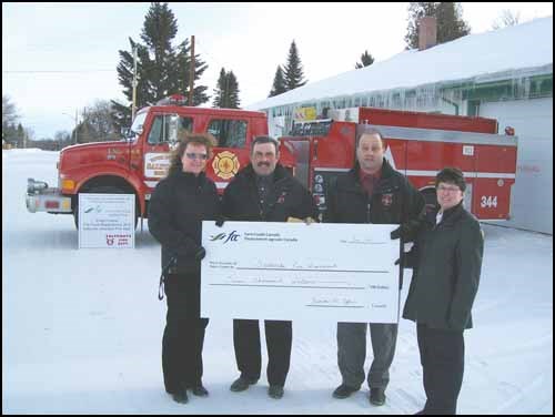 The Saltcoats Volunteer Fire received  a donation in the amount of $7,000.00 from Farm Credit Canada, AgriSpirit Fund. These funds will be used to help defray cost of a new fire truck that was purchased during 2010. The Fire Department, Town and RM of Saltcoats are very thankful for this donation from Farm Credit Canada. Pictured above from left to right are Kathy Pearson, Account Manager FCC, Harry Smith Fire Chief, Saltcoats Fire Dept, Ron Risling, Treasurer Saltcoats Fire Dept and Debbie Zulyniak, Customer Service Rep. FCC.