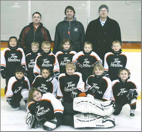 Front: Haley Schrader; front row, from left: Vinay Junek, Jye Zawatsky, Grady Hoffman, Emma Edel, Izaia Gaudry; middle row, from left: Lonnie Badger, Daxton Kulcsar, Landon Burkell, Camryn Dubriel, Nicholas Gordon, Jayden Halliday; back row: Jon Gaudry, coach, Fred Schrader, coach, Ryan Hoffman, coach.