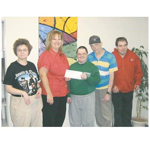 The Rotary Club of Yorkton made a valued 
donation to the Spirit of Success Fund. The Fund was created to celebrate 60 years of success for the Saskatchewan Abilities Council and to raise much needed funds for supplies and programs for the clients of the Parkland Ability Centre and the Tillman Quality of Life Centre. A $500 donation was made to the Spirit of Success Fund from the Rotary Club.  The funds raised will directly 
benefit the clients of the Parkland Ability Centre and the Tillman Quality of Life Centre. On behalf of the clients and staff of the Yorkton Branch, thank you to the Rotary Club and many other community members and businesses for supporting the Spirit of Success Fund. Pictured Left to Right are: Day Program Client Nadia Semenuik, Rotary Representative, Linda Turta, Day Program Clients, Jeffery Langley, Larry Krupski and James Jacobs.