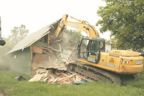 The closed Scout Hall on Betts Avenue in Yorkton was demolished Friday morning. The old hall came down in order for the lot to become the location for the second Habitat For Humanity home to be built in the city. Construction of the new house should begin soon. L&H Excavating did the demolition work on the building.