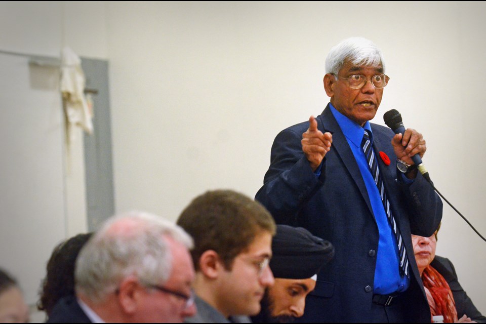 BFC candidate Ben Seebaran addresses the crowd at an all-candidates meetings for school trustees organized by Burnaby DPAC at Stoney Creek Elementary School Wednesday evening.