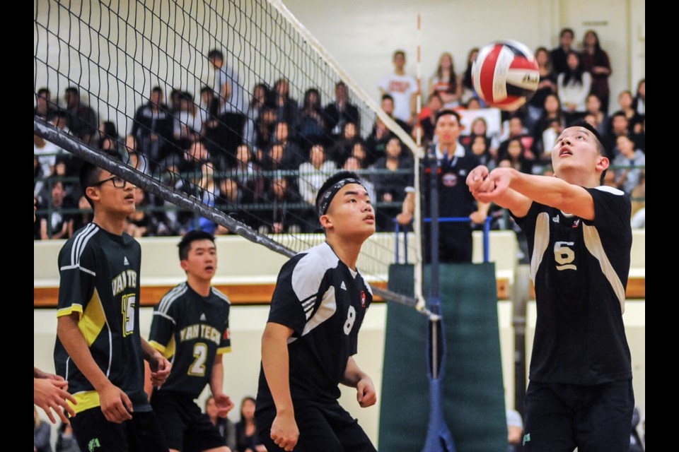 Gladstone Gladiator Steven Trinh sets up the ball in a 3-1 win for the senior boys volleyball championship at Van Tech Nov. 7, 2014. Photo Rebecca Blissett