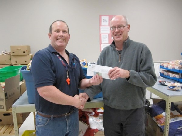 The Kinsmen Aquatic Centre has donated more than $60 and three Rubbermaid totes full of non-perishable food items to the Battlefords District Food and Resource Centre. The proceeds and food items are from the Aquatic Centre Haunted House, held during the evening of Oct. 27. It was regular pool admission to get into the haunted house or a non-perishable food item. Approximately 225 people went through. Patrick Eckerman from the aquatic centre drops off the donations with Bill Hall from the Battlefords District Food and Resource Centre.