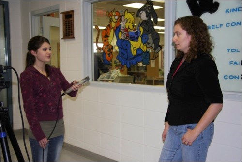 Victoria Oliver one of Paradise Hill School's journalism team interviews Kelly-Anne Riess. She led the students in creative writing activities.