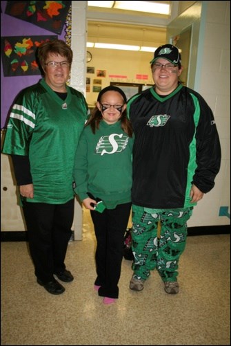 Three generations of Rider fans in the school are Gerri Kalmakoff and Seairra and Chantelle Stapleton.