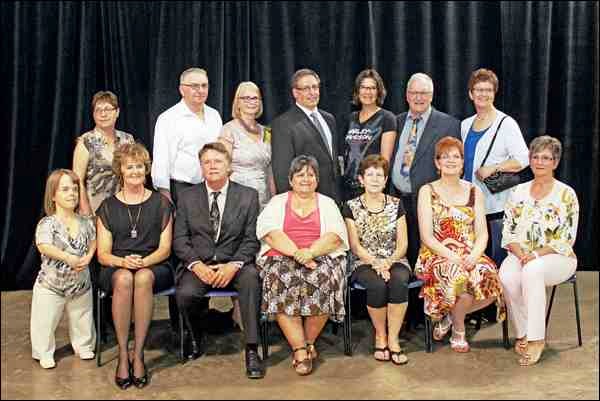 The Living Sky School Division recently held its annual service recognition awards night. Those honoured included this year&#8217;s retirees: Back row left to right, Judy Ebach, George Casey, Maureen Robertson, Gil Meyers, Allison Hawryliw, Yves Côté and Margaret Parkinson. Front row left to right, Linda Nelson, Terry Martens, Brian Quinn, Rona Tyson, Marlene Kurtz, Janice Reade and Cecilia Leibel. Also retiring but missing from the photo are Doreen Buckley, Phyllis Downs, Marian Kimber, Debbie Simon and Sheila Simmons.