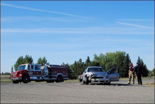 A semi-tractor trailer collided with a small passenger car Thursday by museum road.. There were no injuries.