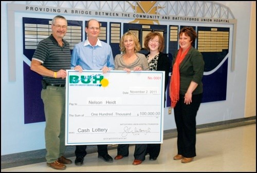 The Battlefords Union Hospital Foundation Cash Lottery officially awarded its prizes on Friday to their two biggest winners. The $100,000 cash prize was awarded to Nelson Heidt of North Battleford, who said he &#8220;didn&#8217;t really believe it at first&#8221; when he was called at work with the good news. He had bought his winning ticket in the lobby of the hospital in response to an ad on the radio. He says he is still trying to figure out what to do with all the money. Pictured in the cheque presentation are Jerry Wintonyk, Nelson Heidt, Claudette McGuire, Shauna McGifford and Andrea Kohut.