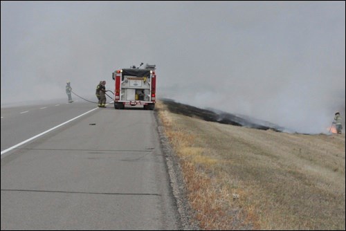 A boot goes to the motorist who passed through the emergency zone, more specifically the kilometre of smoke on Highway 16 Saturday during the grass fire in the ditch, at excess speeds. Not only did the firefighters have to deal with the wind while battling a grass fire, but the unsafe speeds of a few vehicles that passed the scene.