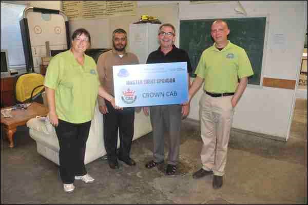 Crown Cab was unveiled as the $5,000 master event sponsor of the day-long Canada Day centennial event on July 1 at the Battlefords Ag Society grounds. This is the second time Crown Cabs has stepped forward to support centennial activities after sponsoring the New Year&#8217;s party last Dec. 31. Shown in the photo from Wednesday are Tammy Donahue-Buziak of the Cente North Battleford 2013 Centennial Committee, Imran Zaka of Crown Cab, Mayor Ian Hamilton and Mike Halstead, city markedting and communications co-ordinator.