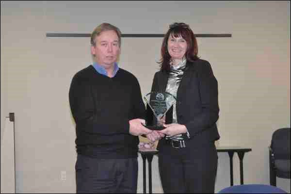 An award was presented by the Saskatchewan Association of Social Workers Battlefords branch to Karen Richard, long-time executive director of Catholic Family Services March 19. It was an award of recognition to Richard for &#8220;her dedication to the values and principles of the social work profession within our community.&#8221; The award was presented to Richard by Jim Walls, who cited Richard&#8217;s leadership with Catholic Family Services and the community services it provides, as well as her activities with many agencies including Big Brothers and Big Sisters, Boys and Girls Club, Sask. Justice, KidsFirst, and several others.