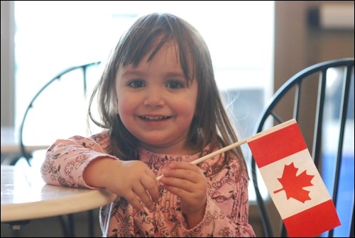 Two-year-old Sara Secujski has a lot to smile about. Feb. 8, Sara, along with her mother, Sonja, father, Srdjan, and brother, Stefan, became Canadian citizens during a ceremony at Fort Battleford. The Secujskis, originally from Serbia, have been living in the Battlefords for five years. &#8220;It&#8217;s safe for kids,&#8221; said Sonja. &#8220;People are friendly.&#8221;