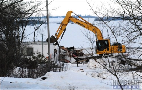 The cabin belonging to Naomi Ramsay, chair of the Waldsea Lake Regional Park Board, was knocked down the morning of March 16. Demolition, which was not going to start until March 18, started ahead of schedule due to warming temperatures last week. All of the cabins inside the park, and the park buildings, will be either moved or torn down and taken away before the area floods this spring.