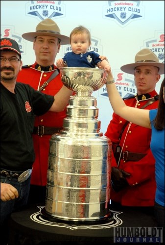 Little Leafs fan Farryn Poncelet, daughter of Craig and Tasha Poncelet of Humboldt, looked a little surprised to find herself sitting in the Stanley Cup.