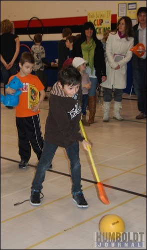 This little boy was taking part in the Broomball Shoot.