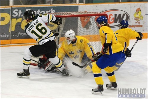 Adam Antkowiak of the Humboldt Broncos sends some ice into the face of Swedish goaltender Marcus Hogberg in the final seconds of the first period of the game between the Broncos and the under-17 Swedish national team, played in Humboldt on January 1.