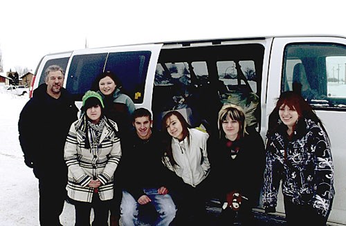 Christmas is a time for giving. Pictured above are a group of Sacred Heart High School students along with teacher Scott Hoffort with food contributions to the school project &#8220;Gifts of Joy.&#8221; Staff and students collected food items to help those in need during the Christmas season.