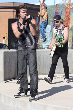 Versus The Nothing recently performed a free concert in the city, to promote their new release, the Black Gloves EP and their upcoming performance with Hinder on August 22. at the Gallagher Centre. Pictured above, Ross Archibald (l) and Ande Otte perform with the band at Western Financial Group City Centre Park.