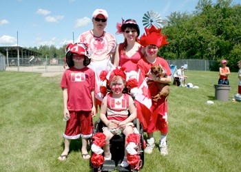 The McLennan family &#8211; Tiffany, Andy, David, Raquel, Brent and even pup Maggie &#8211; get into the spirit.