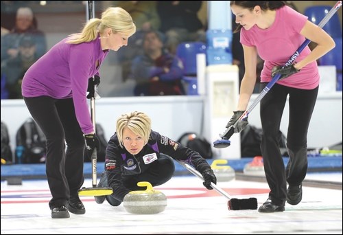 Kristin Fewster (right) competes at the the 2014 provincial championships in Prince George. Fewster and her team qualified for the nationals this weekend.