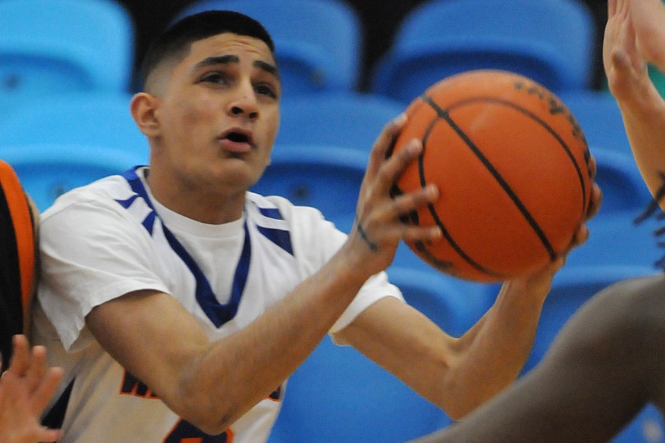 Windermere Warrior Ravi Basra (No. 9) averaged 30 points per game during his senior season in 2014--15. Photo Dan Toulgoet