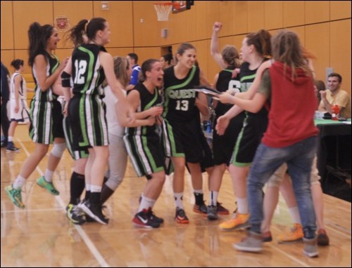 The Quest women's basketball team celebrate after defeating VIU 74-73 on Saturday (Feb. 28) to complete a perfect season.