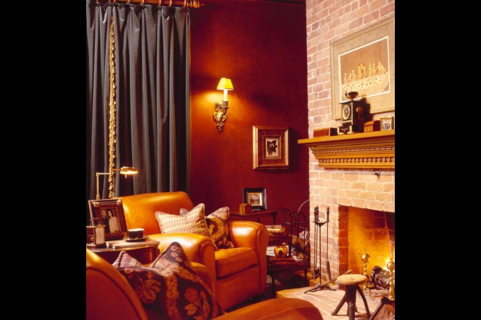 Polished faux leather walls, full length velvet drapes and comfy leather chairs produce an irresistible den or study.