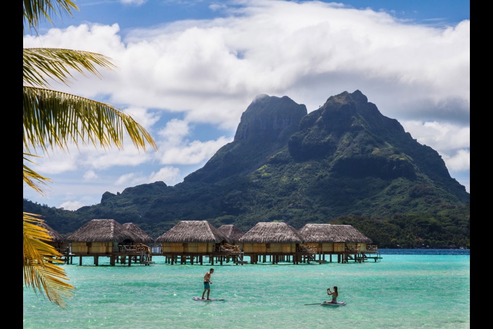 Mount Orohena frames the scene at the Bora Bora Pearl Beach Resort at Bora Bora in the Society Islands, French Polynesia.