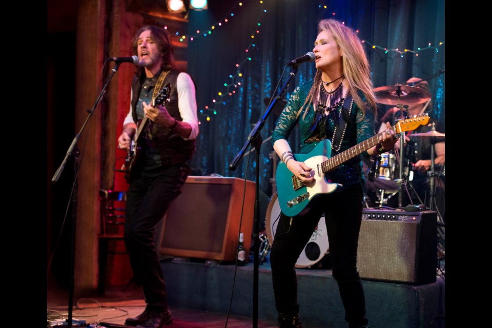 Two names you wouldn't expect to see sharing the same marquee: Meryl Streep and Rick Springfield rock out and occasionally make out in Ricki and the Flash.