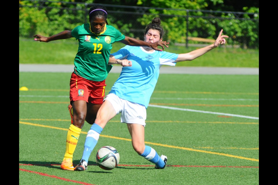 Cameroon arrived in 鶹ýӳon May 15 in advance of the FIFA World Cup, which begins June 6 when Canada plays China at Commonwealth Stadium in Edmonton. Les Lionnes played the first of two test-matches against the North Shore Girls Soccer Club at Windsor Turf Field on May 17.Cameroon was the first of 24 teams to arrive in Canada for the World Cup, landing at YVR May 15, 2015 before taking to the pitch against the North Shore Renegades. Photo Cindy Goodman