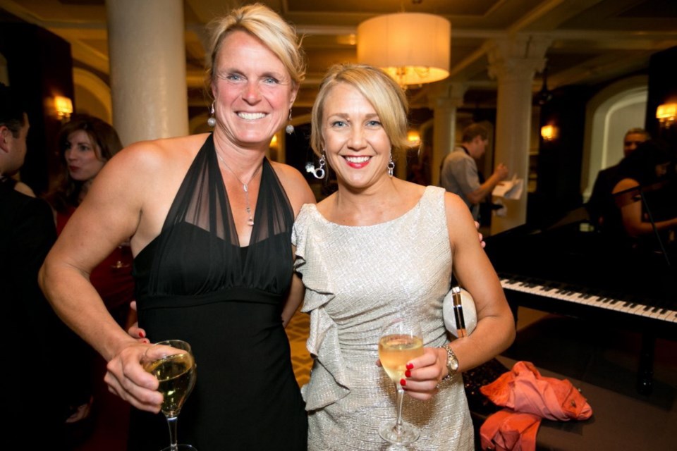 Publisher Sue Hodgson, left, and entrepreneur Angela Cote at the reception.