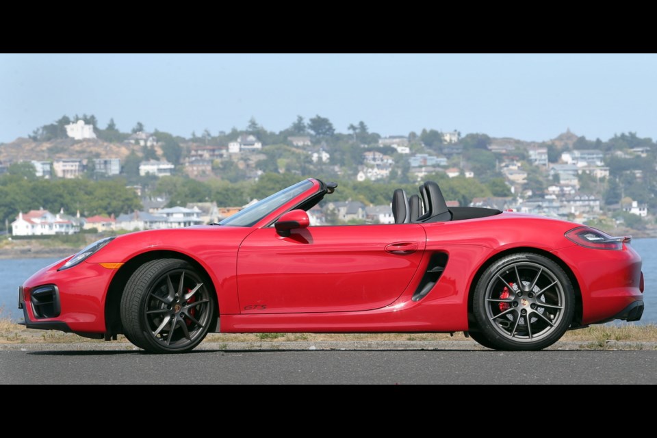 The 2015 Porsche Boxster GTS might not look substantially different on the outside from its predecessors, but the powertrain has been upgraded to put the convertible in the same league as the more-expensive 911 Carrera.