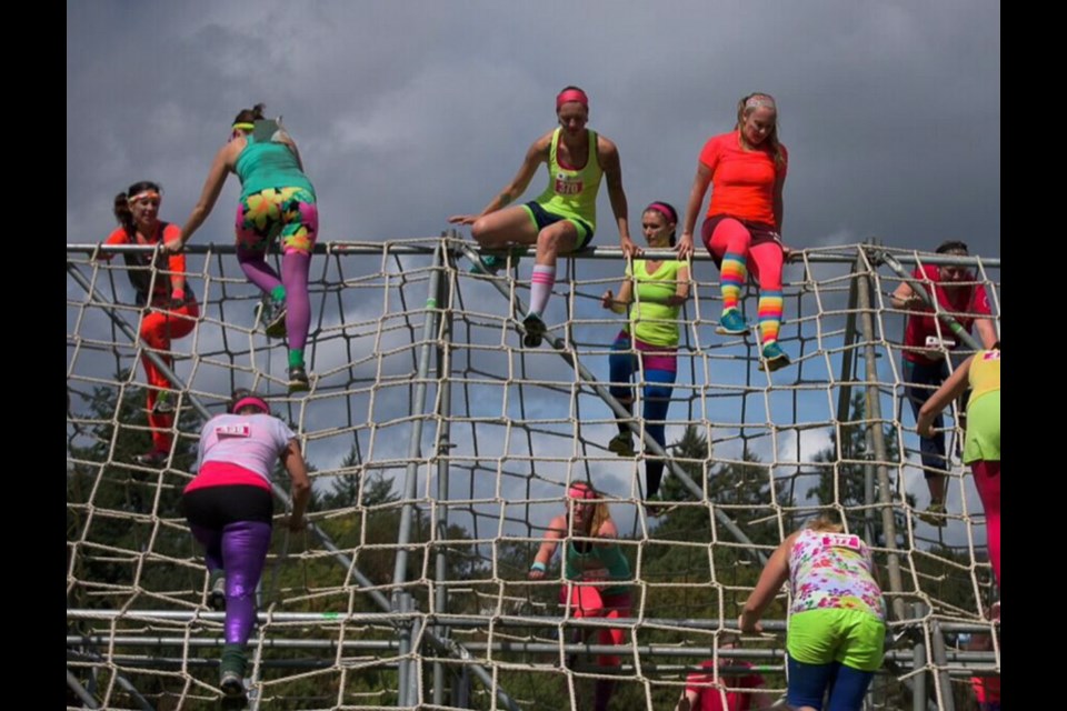 The region&Otilde;s first Woman2Warrior event, held at West Shore Parks and Recreation, raised more than $50,000 for Easter Seals camps in saʴý