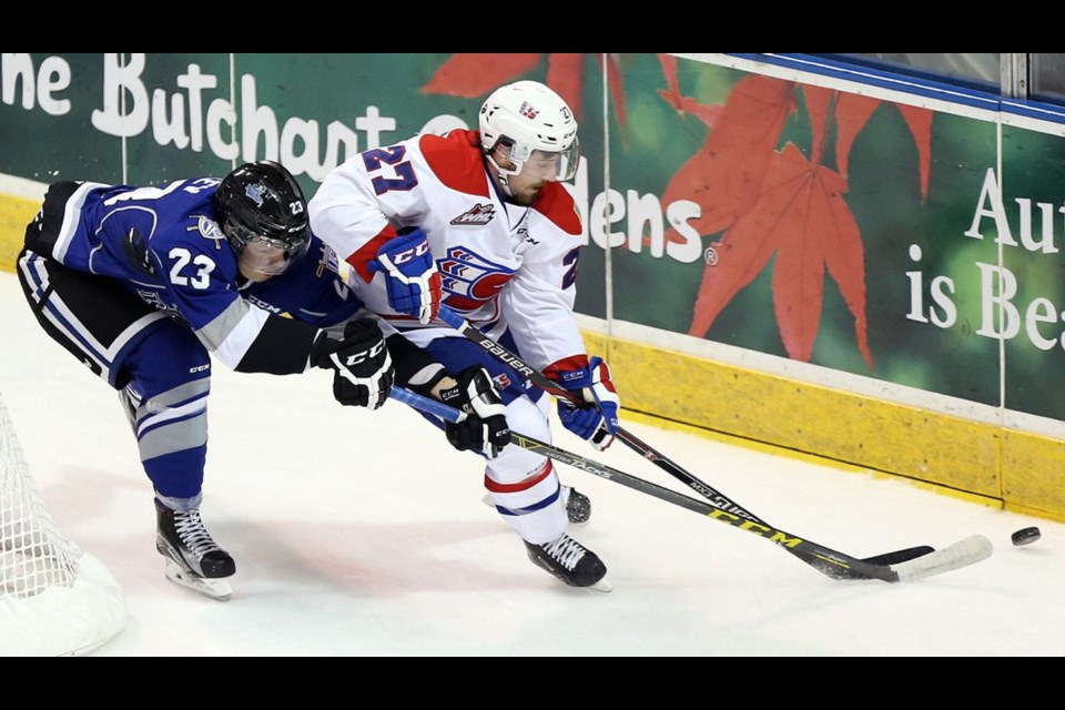 Royals forward Vladimir Bobylev chases down Chiefs winger Kolten Olynek during the first period at Save-on-Foods Memorial Centre on Tuesday