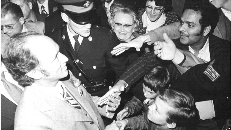 Enid Fitzsimmons, shown here behind an RCMP officer, was an Albertan, and the author's grandmother, who sent letters to Prime Minister Pierre Elliott Trudeau, to which he responded with gratitude. His son, Justin Trudeau, now the prime minister-designate, is reaching out to voters via social media.