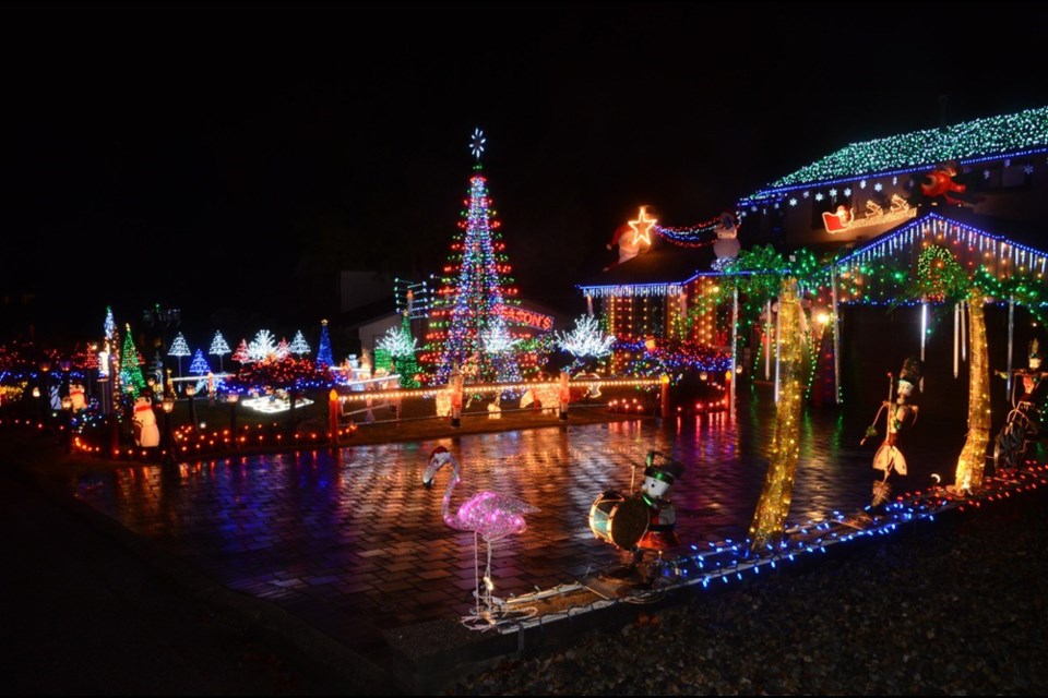 You can find the DuPlessis family Christmas display at 8222 Burnlake Dr., not far from Burnaby Lake. This year’s display is brighter than ever. The Duplessis spent three weeks to planning, researching and executing the display, which is computer controlled. Highlights include a tree with a new star, Charlie Brown characters and a mini ice-rink, a 14-foot Santa, reindeer and more. The display is on every day, from 4:30 to 11:30 p.m. until Jan. 4. The DuPlessis are collecting donations for the B.C. Children’s Hospital.