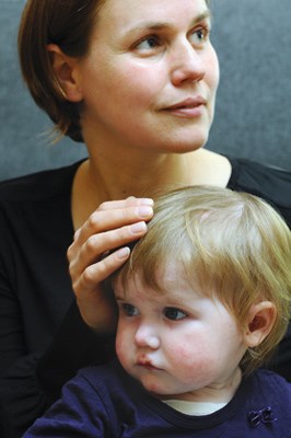 Renata Hozova spends a moment with her daughter. Based on Raquel's diagnosis with a rare incurable disorder, life can be challenging; however, there are many good times and those are what help the family to not lose hope.