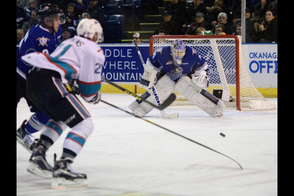 Kelowna Rockets defender Devante Stephans takes a shot on the Victoria Royals&Iacute; net.