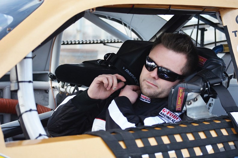 Dylan King straps himself in to make his first of two 20-lap runs around the half-mile track at Rockingham Speedway in North Carolina on Sunday, Jan. 11.