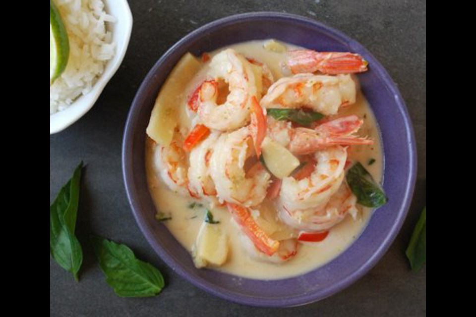 Thai-style Green Curry Prawns has a luxurious coconut-milk base and additional flavour from red bell peppers and bamboo shoots. The curry can be as hot — or not — as you like it.