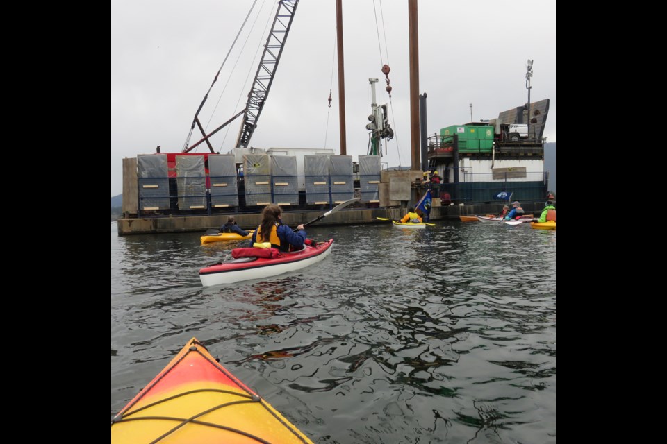 A group of ‘kayaktivists’ surrounded Kinder Morgan’s drilling barge by the Westridge Marine Terminal on Sunday.