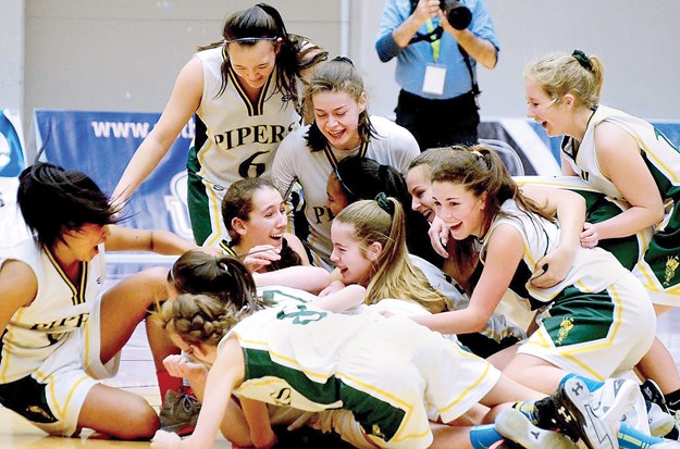 The Argyle Pipers junior girls team celebrates a championship win at the provincial tournament held last week at Langley Events Centre. The fourth-ranked Pipers beat the No. 1- and No. 2-ranked teams to score gold, led by a 44-point performance from Georgia Swant in the final. photo supplied