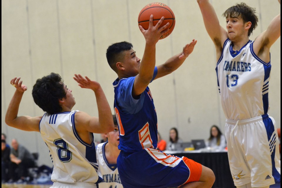 McNair Marlins Ryan Angala goes to the basket during Saturday's win over Charles Hays in consolation play at the B.C. AAA Boys Basketball Championships. The Grade 12 standout averaged over 25 points per game at the provincials.